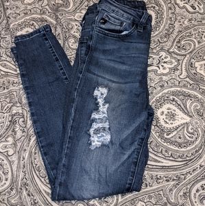 Never worn, dark wash, distressed jeans
